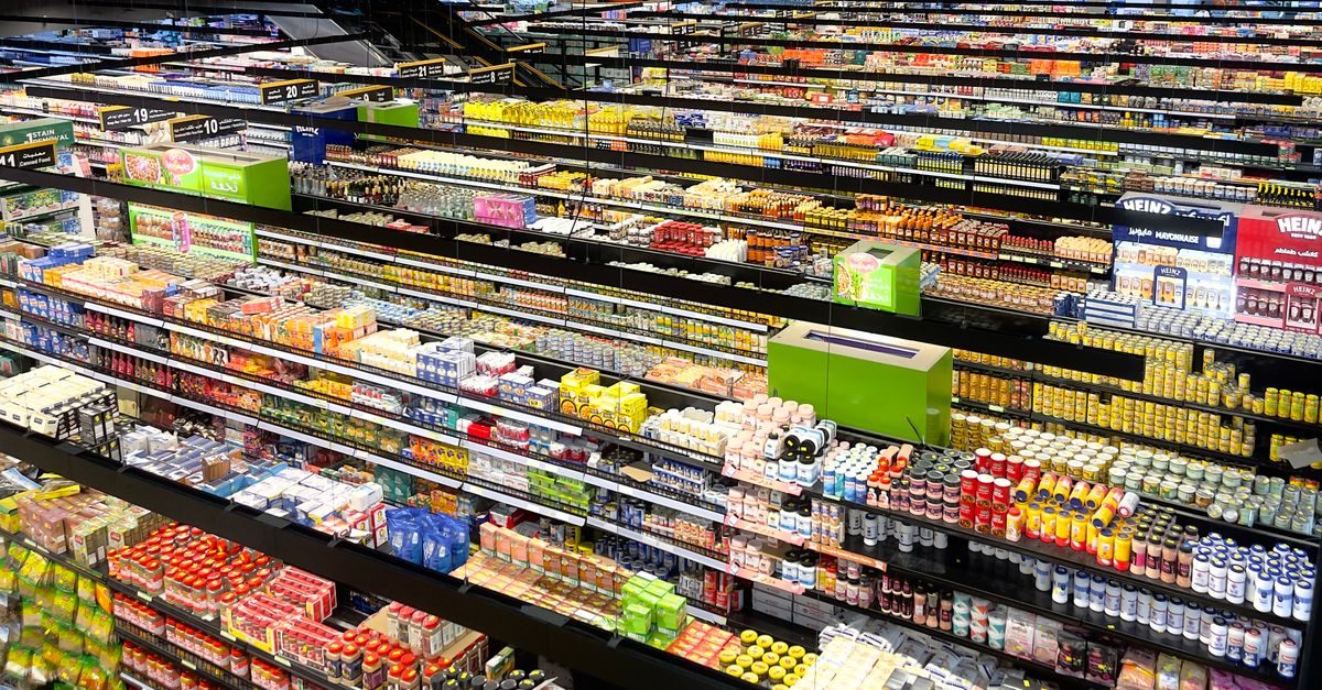 Supermarket aisle with full shelves