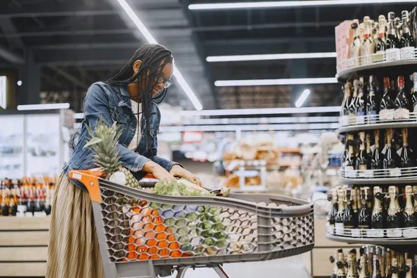 Shopper picking up the exact product inside a store